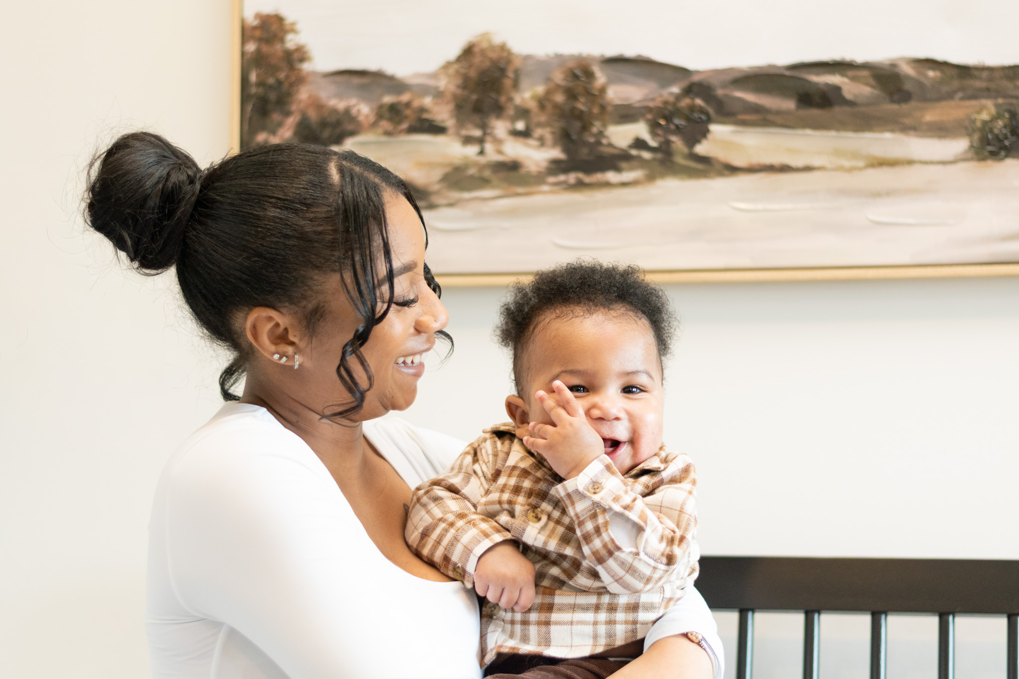 Mother and laughing baby