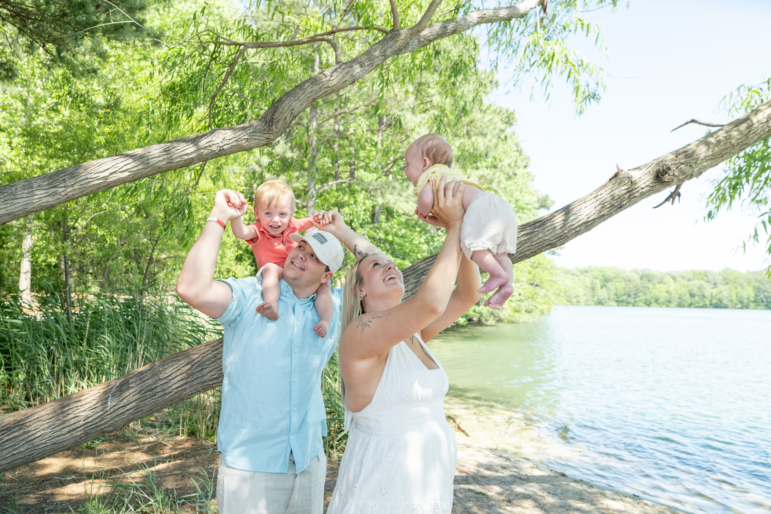 baby-motley-&-family-crisis-pregnancy-center-of-tidewater Family of four at a lakeside